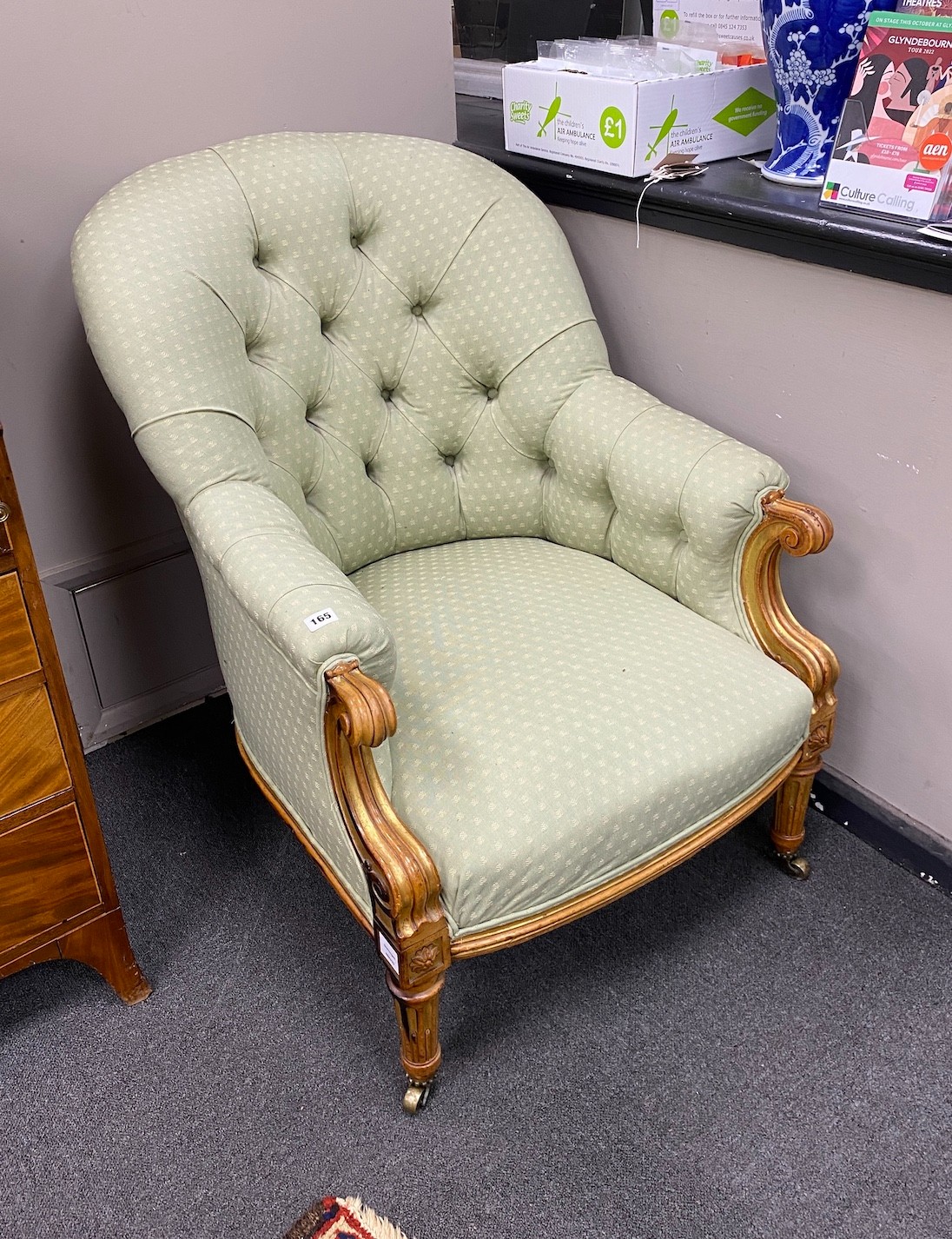 A Victorian carved upholstered elbow chair, width 70cm, depth 90cm, height 92cm